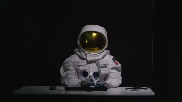Astronaut Sitting Desk Using Computer Interactive Touch Screen — Stock Video