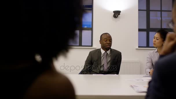 4k Business Executives In Boardroom Meeting Tv With News Report In Background