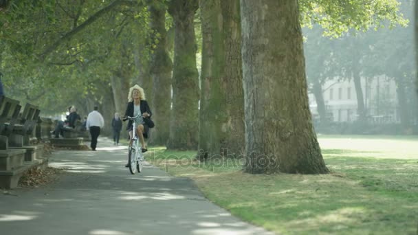 Cheerful Professional Woman Riding Bicycle City Park — Stock Video