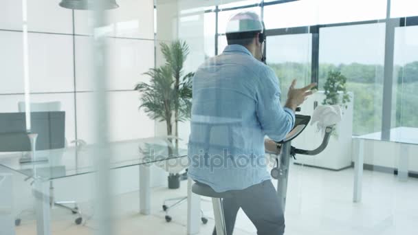 Businessman Cycling Office While Talking Headset — Stock Video