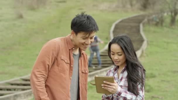 Happy Young Asian Family Spending Time Outdoors Countryside — Stock Video