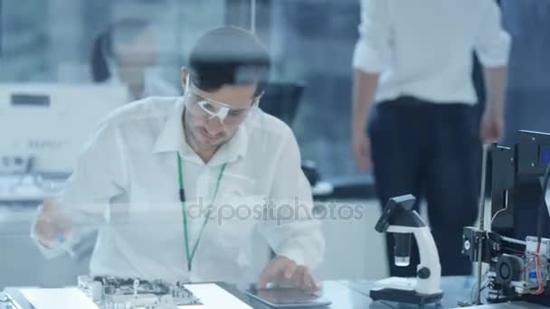 Electronic Engineer Working Lab Testing Printer Circuit Boards — Stock Video