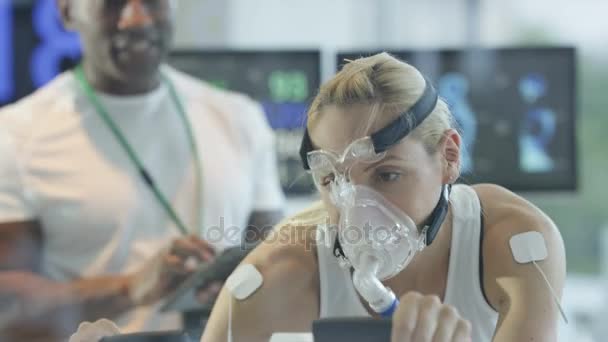 Female Athlete Training Hard Being Tested Monitored Sports Scientist — Stock Video