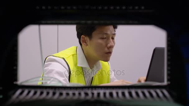 Computer Technician Checking Equipment Data Center Server Room — Stock Video