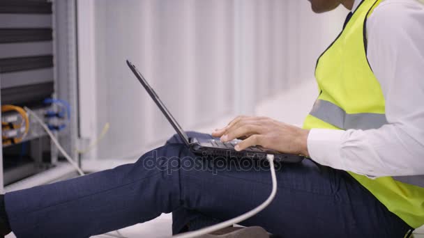 Close Hands Engineer Sitting Floor Laptop Data Center — Stock Video