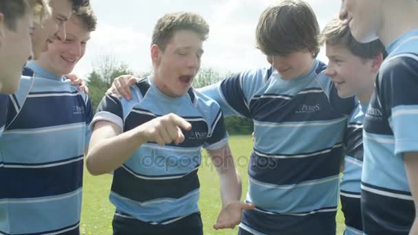 Teen Boys Huddle School Sports Field Having Team Talk Game — Stock Video