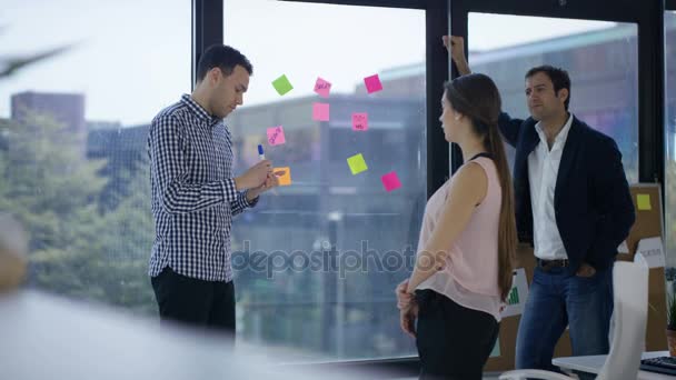 Business Team Modern Office Brainstorming Coloured Notes Window — Stock Video