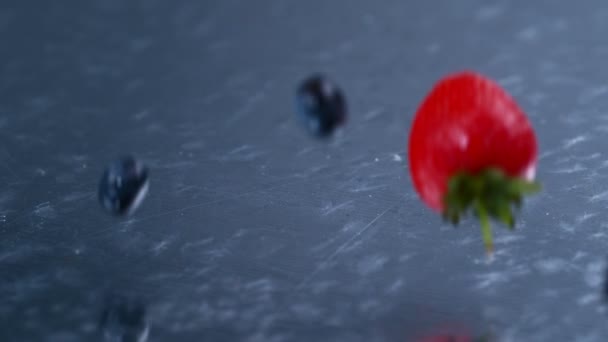 Slow Motion Fresh Berries Falling Splashing Clean Fresh Water — Stock Video