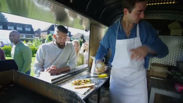 Cheerful Food Vendor Burger Van Serving Customers Community Event — Stock Video