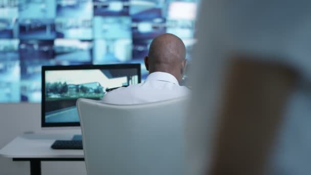 Security Team Watching Cctv Screens Control Room Officer Talking Radio — Stock Video