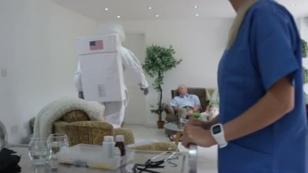 Funny Astronaut Behaving Badly Stealing Medication Residents Nursing Home — Stock Video