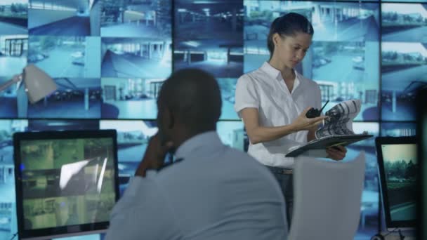 Security Team Watching Cctv Screens Control Room Officer Talking Radio — Stock Video