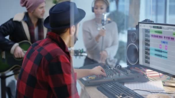 Sound Engineer Mixing Desk Recording Track Young Musicians — Stock Video