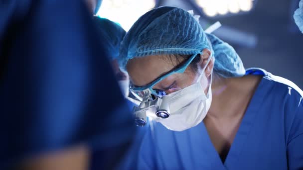 Surgeons Operating Patient Assistant Wiping Sweat Surgeon Face — Stock Video