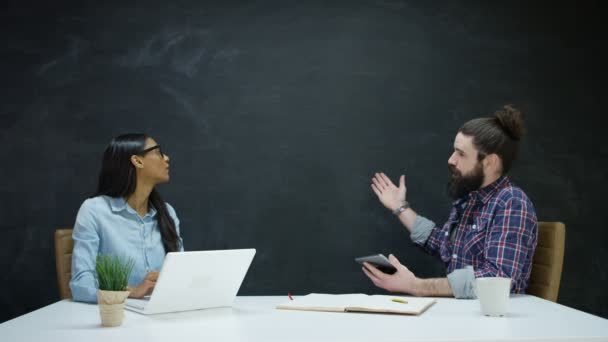 Man Woman Working Using Technology Looking Blackboard Background — Stock Video