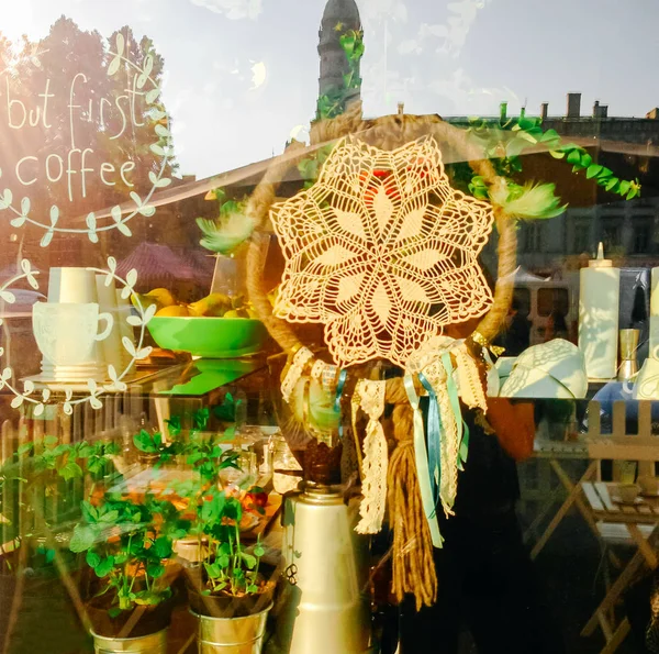 Picture of cafe showcase with dream catcher in it — Stock Photo, Image