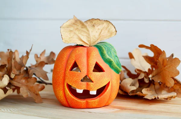 Picture of pumpkie over white wooden background. Halloween conce — Stock Photo, Image