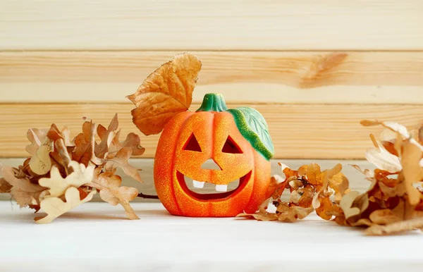 Picture of pumpkie over wooden background. Halloween funny conce — Stock Photo, Image