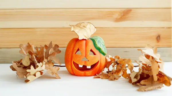 Picture of pumpkie over wooden background. Halloween funny conce — Stock Photo, Image