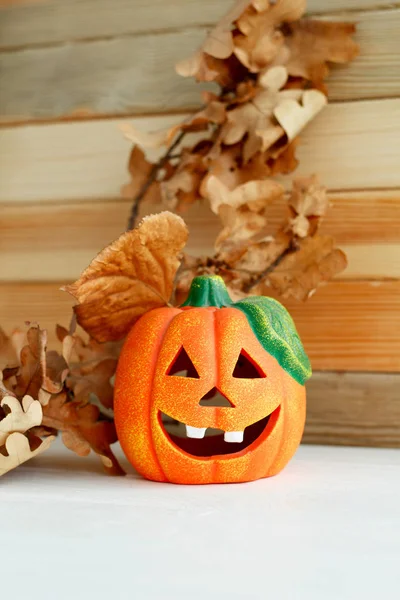 Picture of pumpkie over wooden background. Halloween funny conce — Stock Photo, Image