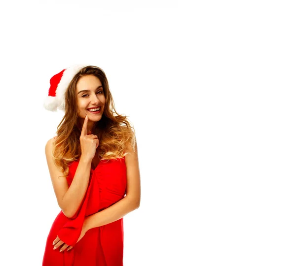 Young attractive Santa girl in red dress over white background — Stock Photo, Image