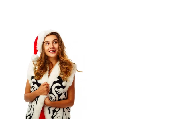 Junge attraktive Weihnachtsmädchen in rotem Kleid auf weißem Hintergrund — Stockfoto