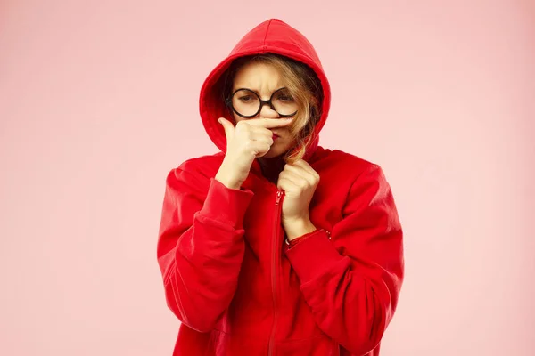 Portrait of young sad sick student in black glasses in hood over — Stock Photo, Image