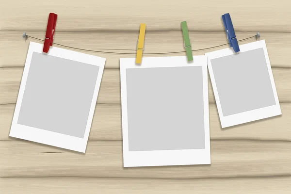 örnek fotoğraf çerçevesi üzerinde bir ip çok renkli clothespins ile