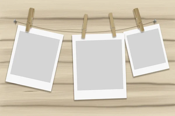örnek fotoğraf çerçevesi üzerinde bir ip ahşap clothespins ile