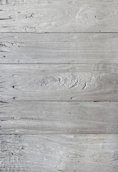 White grunge wood texture background with dents and cracks
