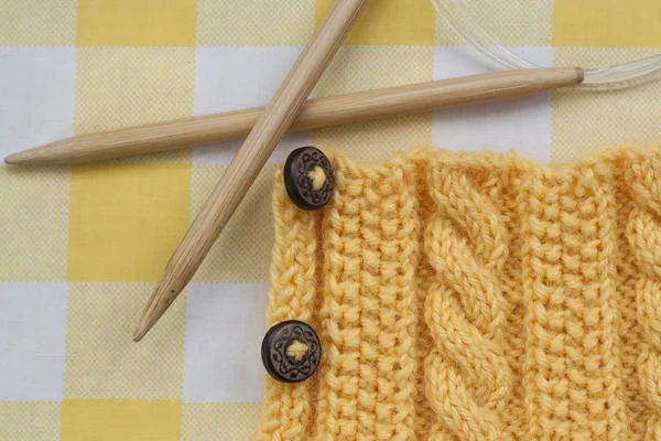 Knitting pattern and needles on a background — Stock Photo, Image