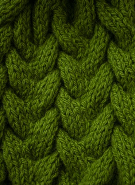 Wzór jasnonasyconej zielonej nitki wełnianej, dzianej. — Zdjęcie stockowe
