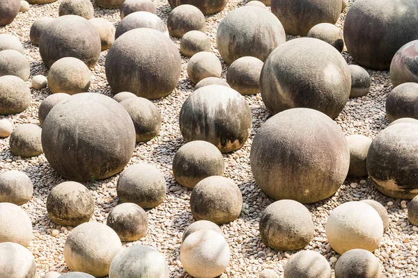 Stone sphere in garden