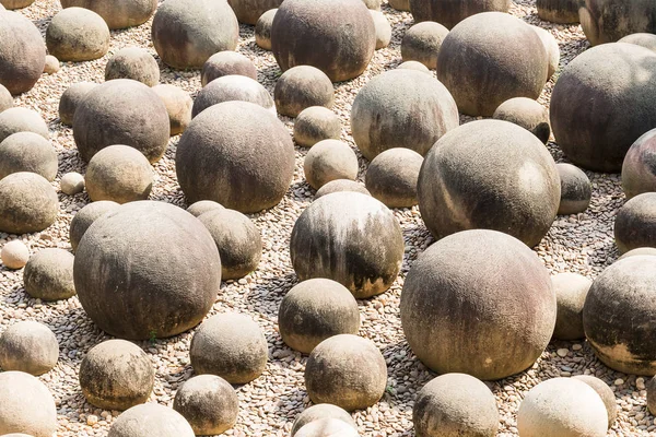 Stone sphere in garden