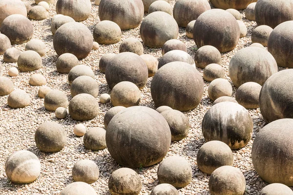 Stone sphere in garden