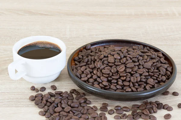 Coffee beans and coffee cup — Stock Photo, Image