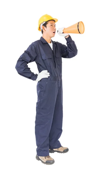 Young worker shouting for announce through a megaphone — Stock Photo, Image