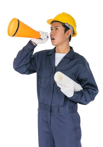 Joven trabajador gritando para anunciar a través de un megáfono — Foto de Stock