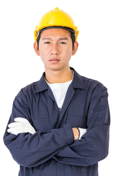 Unga arbetstagare står med arm korsade — Stockfoto