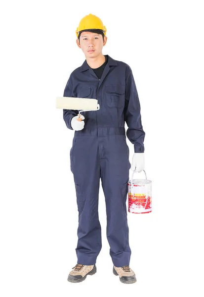 Worker in a uniform using a paint roller is painting invisible w — Stock Photo, Image
