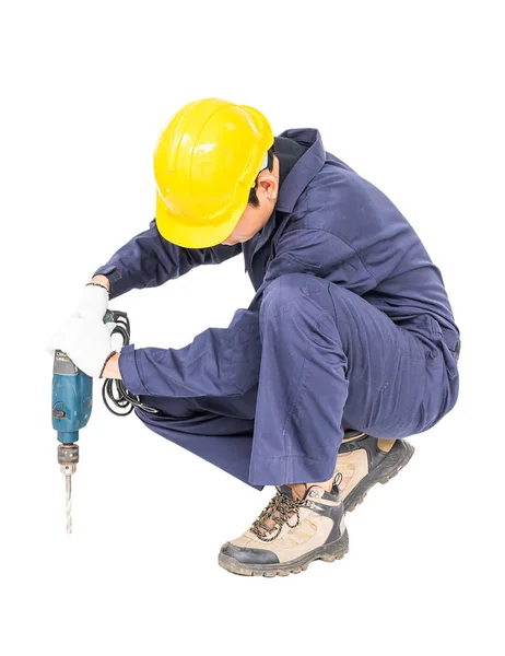 Handyman em unifrom sentado com sua broca elétrica — Fotografia de Stock