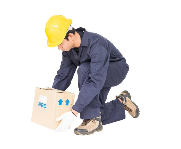 Man in uniform lifting the paper box — Stock Photo, Image