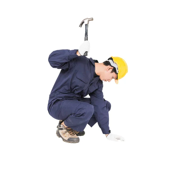 Handyman de uniforme com seu martelo — Fotografia de Stock