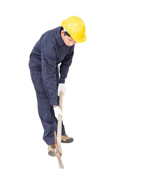 Man in uniform hold old pick mattock that is a mining device — Stock Photo, Image