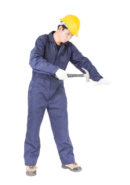 Handyman in uniforme con il suo martello — Foto Stock