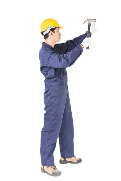 Handyman en uniforme con su martillo — Foto de Stock