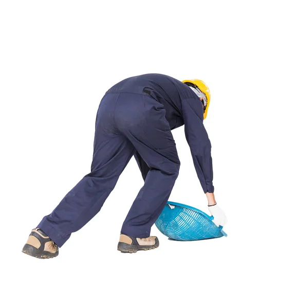 Young worker hold Hod or clam-shell shaped basket — Stock Photo, Image