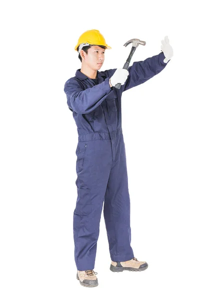 Handyman en uniforme con su martillo — Foto de Stock