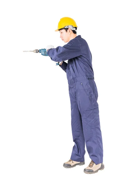 Handyman i jämn stående med hans borrmaskin — Stockfoto