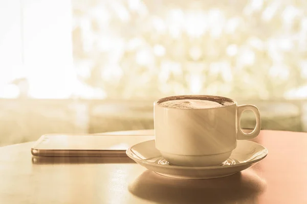 Cup of hot coffee on wood table — Stock Photo, Image